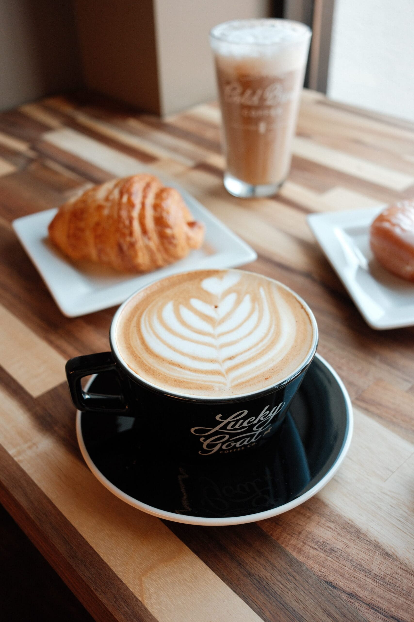 lucky goat coffee Destin Florida pumpkin spice latte and croissant 